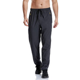 1 x RAW Customer Returns CUNYI Jogging bottoms for men, training trousers, quick-drying running trousers, hiking trousers, breathable with pockets, dark gray 36 - RRP €25.8