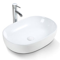 1 x RAW Customer Returns Oval white washbasin - Countertop washbasin made of ceramic - Countertop washbasin for bathroom and guest toilet - Washbasin with lotus effect - Modern hand washbasin - 59 41 14.5 cm - Without tap hole - RRP €95.99