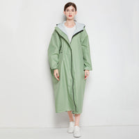 1 x RAW Customer Returns Gaga city Waterproof Poncho Raincoats for Women Unisex with Front Pocket Long Sleeves with Elastic Cuffs, Snap Button at Hem to Green - RRP €37.1