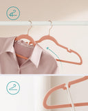 1 x RAW Customer Returns SONGMICS Velvet Coat Hangers 50 Pieces, Non-Slip, Shoulder Grooves, Trouser Bar, 360 Rotatable Hook, Space Saving, 0.6 cm Thick, 43 cm Wide, Light Pink CRF029PK05 - RRP €41.29