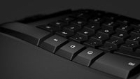 1 x RAW Customer Returns Microsoft Ergonomic Desktop set with mouse and keyboard, German QWERTZ keyboard layout, black, ergonomic, wired  - RRP €77.54