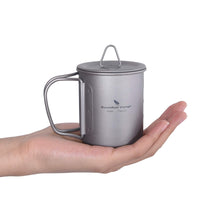 1 x RAW Customer Returns iBasingo 200ml Camping Mug Outdoor Cup Titanium Drinking Mug with Lid Folding Handle Ultralight Tea Coffee Water Cup Picnic Cookware Ti3033D - RRP €25.98