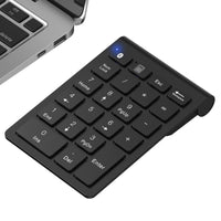 1 x RAW Customer Returns cimetech Bluetooth Numpad - wireless numeric keypad with 22 keys -10 multifunction keys Multimedia keys Wireless number pad for - Laptop Desktop Notebook Black  - RRP €17.84