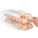 1 x RAW Customer Returns CRROEL Egg Holder for Refrigerator, Egg Box for 28-32 Eggs, Clear Double Layer Type Egg Storage Rack with Handle, Portable Egg Storage Box with Lid, Rolldown Egg Organizer - RRP €18.98