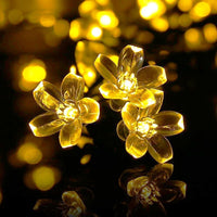 1 x RAW Customer Returns Qedertek Solar Fairy Lights Outdoor 7M 50 LED Flower Fairy Lights Outdoor Solar Waterproof IP65, 8 Modes Solar Fairy Lights for Garden, Patio, Balcony, Trees, Weddings, Party Decoration Warm White  - RRP €13.99