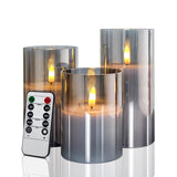 1 x RAW Customer Returns Rikiss LED candles flameless in glass, grey flickering candles, column 7 x 10 12 15 CM battery operated, candles with remote control and timer function - RRP €25.2