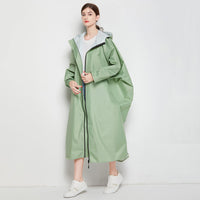 1 x RAW Customer Returns Gaga city Waterproof Poncho Raincoats for Women Unisex with Front Pocket Long Sleeves with Elastic Cuffs, Snap Button at Hem to Green - RRP €37.1