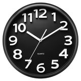 1 x RAW Customer Returns Plumeet 25cm Small Wall Clock, Non Ticking Silent Quartz Decorative Clocks, Modern Style Good for Home Kitchen Living Room Bedroom Office, Large 3D Number Display, Battery Operated Black  - RRP €23.2