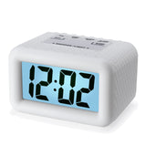 1 x RAW Customer Returns Plumeet LCD Travel Alarm Clock, Easy to Use, Digital Alarm Clock, with Protective Silicone Cover, Digital Display with Large Numbers, Good Backlight and Snooze Function White  - RRP €17.59