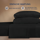 1 x RAW Customer Returns Dreamzie bedding set 4-piece made of microfiber, 1 smooth fitted sheet 180x200cm, 1 flat sheet 270x290cm and 2 pillowcases 50x80cm - black - RRP €25.99