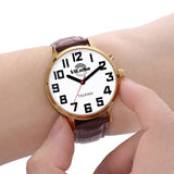 1 x RAW Customer Returns ViLoSa Talking Clock in English Clear and Loud Voice Speaks Time, Date or Alarm Time for Seniors, Visually Impaired or Blind, Gold Colored, Strap - RRP €52.8