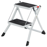 1 x RAW Customer Returns SONGMICS folding stepladder with 2 steps, stepladder, ladder, 20 cm wide steps, non-slip rubber mat, with carrying handle, load capacity up to 150 kg, made of steel, white-black GSL02WT - RRP €31.73