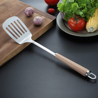 1 x Brand New Spatula with slots, kitchen helper slotted turner made of 304 stainless steel with ergonomic wooden handle for kitchens. - RRP €12.9