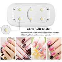 1 x RAW Customer Returns BAQI Mini UV LED Nail Lamp, Portable 6W USB Nail Dryer, Polish Curing LED Manicure Tool, Gel Light Mouse Shape Pocket Nail Art Tool for Home and Salon, Pink - RRP €6.04