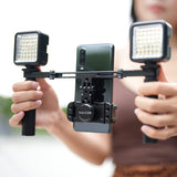 1 x RAW Customer Returns NICEYRIG Dual Handheld Smartphone Stabilizer Vlog Vlogging Lives Video Recording Kit with Foldable Grip for Android Cell Phone and iPhone 14 13 12 11 XS Pro Max -521 - RRP €69.35