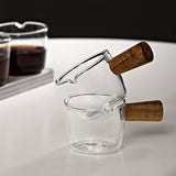 1 x RAW Customer Returns SUQ 2 pieces glass milk cup with wooden handle, mini milk jug, small espresso coffee cup, glass sauce bowl, for coffee, tea or maple syrup, honey sauce, for serving 150ML  - RRP €11.71