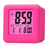 1 x RAW Customer Returns Plumeet Digital Travel Alarm Clock, Easy to Set, with Snooze Mode, Soft Night Light, Large Time, Month, Date and Alarm Display, Rising Sound Alarm Pink  - RRP €18.04