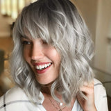 1 x RAW Customer Returns PORSMEER Wig Gray Short Bob Wig with Bangs Natural Ombre Silver Wig Synthetic Hair Colorful Daily Party Halloween Cosplay Wavy Curly Wigs for Women - RRP €21.62