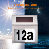 1 x RAW Customer Returns MOLVCE Stainless Steel House Number Solar Illuminated 2 LEDs Solar House Number with Twilight Switch IP65 Waterproof Outdoor with Numbers 0-9 Letters AH - RRP €16.99