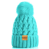 1 x Brand New REDESS Women s Winter Pom Pom Hat Warm Fleece Lined Hats, Thick Soft Snow Knit Crossover Beanie for Ladies - RRP €19.99