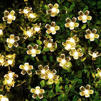 1 x RAW Customer Returns JZK 6.5 m warm white waterproof solar LED flower fairy lights, LED fairy lights for garden decorations, indoor lighting decoration for wedding, Christmas party - RRP €11.11