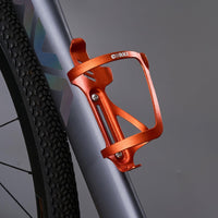 1 x RAW Customer Returns Corki Cycles Bicycle Bottle Cage, Right and Left Slide-Entry Bicycle Water Bottle Holder for Road Bike, MTB, Gravel Bike and E-Bike, Aluminum, Orange, 2Pack Set - RRP €19.15