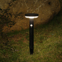 1 x RAW Customer Returns DAWALIGHT LED solar floor lamp outdoor with plug 3 mode 3000K garden light path light with motion detector round IP44 waterproof bollard light for garden terrace driveway, stainless steel, black - RRP €50.41