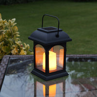 1 x RAW Customer Returns Festive Lights Black Solar Lantern with LED Candle and Deceptively Realistic Flickering Effect, IP44 Waterproof - RRP €21.18