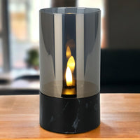 2 x RAW Customer Returns MIJOMA - Elegant LED candle in a glass, warm white, realistic flame, 6 18 timer, battery operated, stylish eye-catcher, authentic look feel 8 x H15 cm, black marble look base  - RRP €31.64