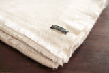 1 x RAW Customer Returns yanopurna cashmere blanket - made of 100 cashmere wool, 135x270 cm, sofa blanket handwoven from Nepal, ideal as a couch throw or cuddly blanket, hand wash, beige - RRP €148.13