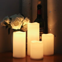 1 x RAW Customer Returns Eldnacele Outdoor Waterproof Flameless Candles with 6-Hour Timer, Battery Operated White LED Pillar Candles for Garden Wedding Lanterns Decoration Set of 4, 7.5cm x 10cm 12.5 15cm 20cm  - RRP €29.99