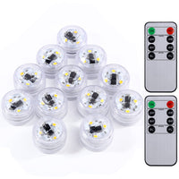 2 x RAW Customer Returns OriFiil LED tea lights with timer, pack of 12 LED candles outdoor with 2 remote controls, battery operated pool lighting underwater for pond fountain wedding party decorations 12 pieces, warm white  - RRP €41.98