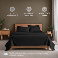 1 x RAW Customer Returns Dreamzie bedding set 4-piece made of microfiber, 1 smooth fitted sheet 180x200cm, 1 flat sheet 270x290cm and 2 pillowcases 50x80cm - black - RRP €25.99