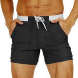 1 x RAW Customer Returns KEFITEVD Men s Swimming Shorts Figure-hugging Slim Fit Beach Pants with Pockets Surf Shorts Board Quick Dry Stretch Waistband Shorts Bathing Surfer Leisure Pants Black 38 - RRP €26.2