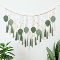 1 x RAW Customer Returns Dremisland Large Macrame Wall Hanging Beige Green Leaves Tassel Tapestry with Wooden Beads Handmade Tapestry Wall Hanging Boho Wall Decoration Bedroom Living Room Children s Room, 130x80cm - RRP €29.33