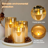 2 x RAW Customer Returns SUNNEST LED flameless candles in glass, battery operated, with remote control and timer function, realistic, warm light with flame shaking effect, set of 3 wax pillar candles, gold - RRP €42.16