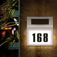 1 x RAW Customer Returns MOLVCE Stainless Steel House Number Solar Illuminated 2 LEDs Solar House Number with Twilight Switch IP65 Waterproof Outdoor with Numbers 0-9 Letters AH - RRP €16.99