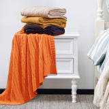 1 x RAW Customer Returns NTBAY Cuddly blanket made of cotton with cable pattern, super soft, warm, multi-coloured, blanket as a sofa blanket, 130 x 170 cm, orange - RRP €26.21