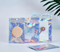 1 x RAW Customer Returns Rimiko 50 pieces holographic ziplock bags plastic bag ziplock, foil bag bag mylar, sample bag resealable for food storage and packaging 7x10cm  - RRP €7.86