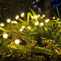 1 x RAW Customer Returns MLOQI Solar Garden Lights Outdoor Solar Lamps for Outdoor Garden Firefly Garden Lights 12 LED Lights Firefly Solar Garden Lights Yard Patio Decorative 4 Pack  - RRP €30.62