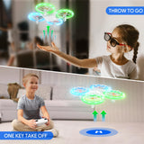 1 x RAW Customer Returns TOMZON Mini Drone for Children, Blue and Green LED Lights, RC Quadcopter with 2 Batteries, Headless Mode, Throw Go 3D Flip Rotation Circle Flight for Beginners Kids Red Propellers - RRP €35.28