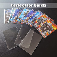 16 x Brand New HUDDU Pack of 100 card sleeves, card foil sleeves for board games and trading cards for Pokemon MTG Magic sports cards, corrosion protection, waterproof, standard size 67 x 94 mm, transparent - RRP €110.08