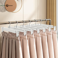 1 x RAW Customer Returns Space-saving trouser hangers, 20 pieces with clip, space-saving skirt holders with 360 swivel hooks, adjustable clips, trouser hangers, for hanging trousers, socks, skirts, coats, white - RRP €21.17