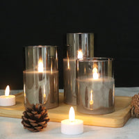 1 x RAW Customer Returns Eldnacele LED candles with timer function, flickering flame, electric real wax candles in glass, 3-piece flameless candle set, LED pillar candles with remote control, art and room decoration, grey - RRP €29.99