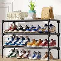 1 x RAW Customer Returns Kitsure shoe rack shoe rack shoe rack premium nonwoven fabric shoe rack shoe rack 4 levels shoe rack stacking rack robust and durable long black - RRP €30.0