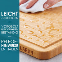 1 x RAW Customer Returns 2-in-1 wooden cutting board and serving tray made of bamboo - large - 38 x 25 x 2 cm - the perfect wooden board for chopping and serving - by LARHN - RRP €14.11