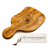 1 x RAW Customer Returns THE OLIVE WOOD BOARD Olive wood cutting board, snack board with handle in natural cut approx. 30cm - RRP €22.07