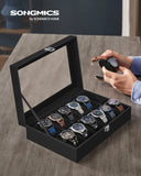 1 x RAW Customer Returns SONGMICS watch box with 12 compartments, watch case with glass lid, watch case with removable watch cushions, metal clasp, gift idea, PU cover in black, velvet lining in black JWB12B - RRP €25.99