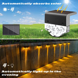 1 x RAW Customer Returns AGOTD Solar Lights for Outdoor Garden, 4 Pack Waterproof Solar Lamp for Garden Decoration, Wall Light Solar Lights with 2 Modes Warm White Amber for Patio Garden Steps Stairs Fences - RRP €28.99