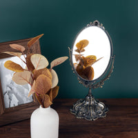 1 x RAW Customer Returns Feyarl 28.5cm Oval Vintage Makeup Mirror Floral Table Mirror with Stand Double Sided Rotating Decorative Mirror Embossed Frame Bronze  - RRP €32.26